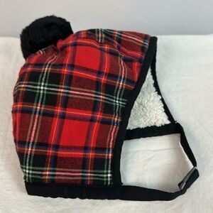 Plaid baby hat with black pom pom